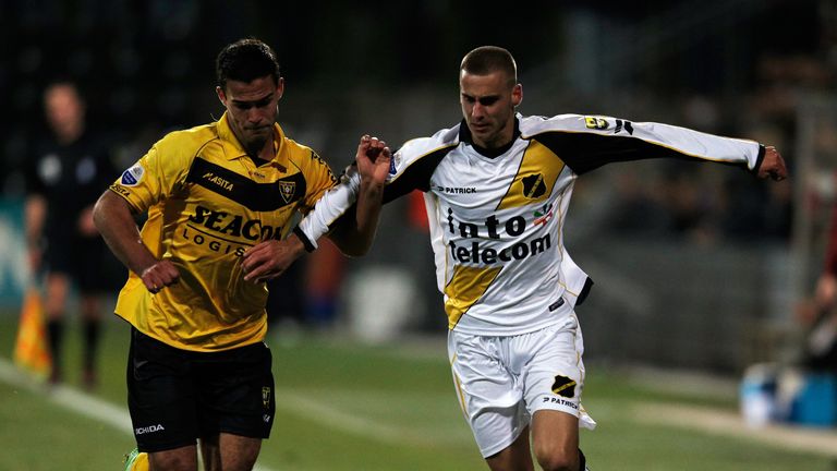 Guus Joppen of Venlo and Jens Janse of NAC battle for the ball
