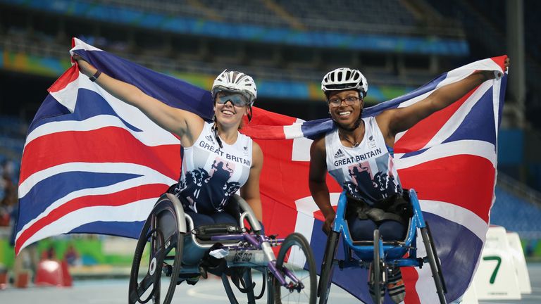RIO DE JANEIRO, BRAZIL - SEPTEMBER 14:  Hannah Cockroft (L) and Kare Adenegan (R) of Great Britain celebrate winning the gold and bronze medals in the Wome