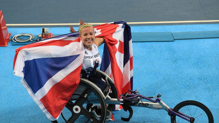 Great Britian's Hannah Cockroft celebrates winning gold in the Women's 100m T34 Final at the Olympic Stadium during the third day of the 2016 Rio Paralympi