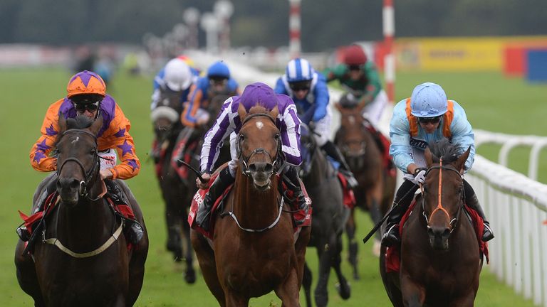 Harbour Law ridden by George Baker (left) beats Ventura Storm ridden by Silvestre De Sousa (right) to win the Ladbrokes St Leger Stakes during day four of 