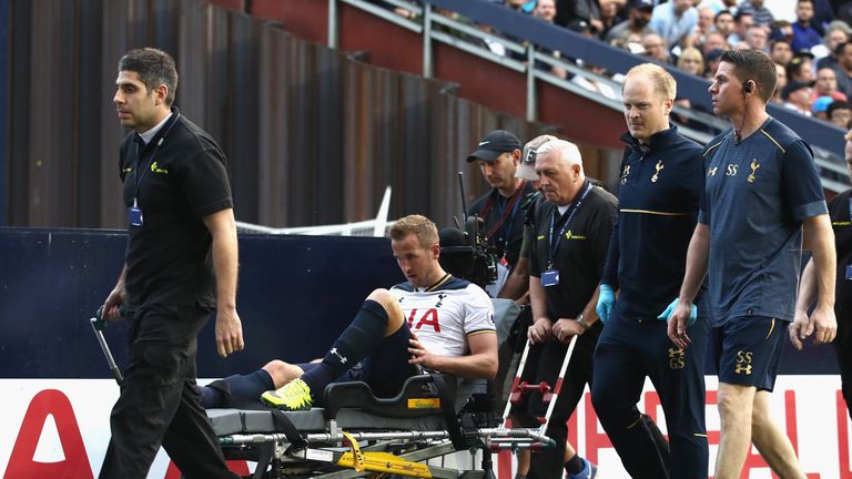 Kane is stretchered off at White Hart Lane last weekend