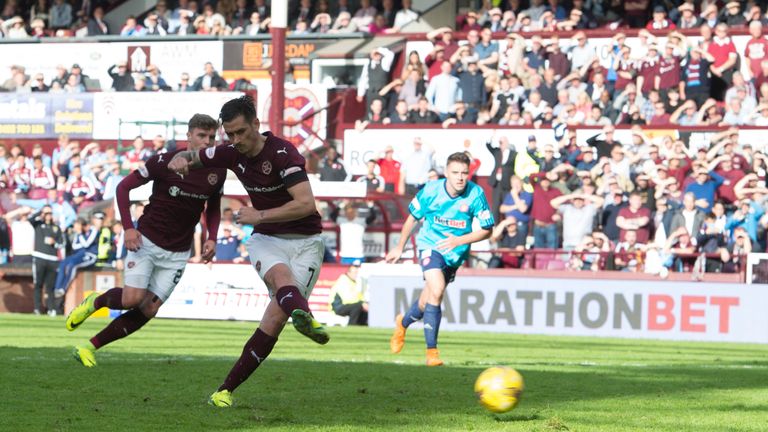 Hearts' Jamie Walker puts his side in front from the penalty spot