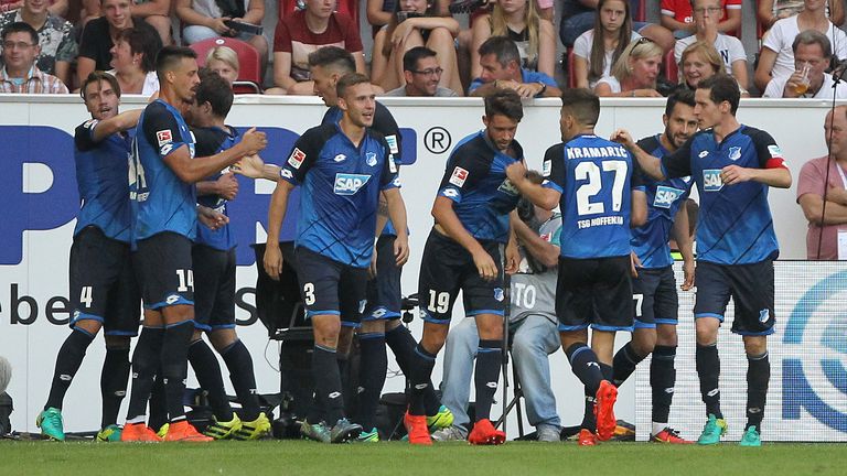 Hoffenheim's players celebrate after scoring the 4-4  during the German first division Bundesliga football match between FSV Mainz and TSG Hoffenheim in th