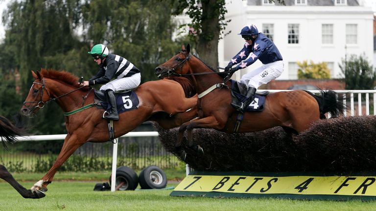 Roadie Joe ridden by Paul Moloney (right) on their way to victory in the Touchmore Up Up and Away Beginners' Steeple Chase at Worcester Racecourse, Worcest