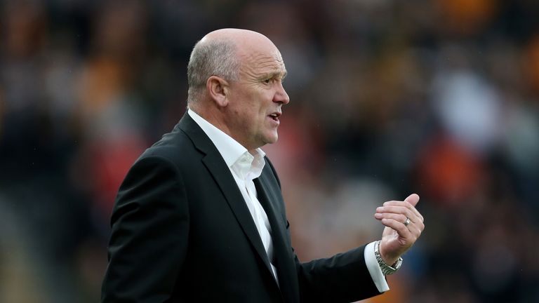 HULL, ENGLAND - SEPTEMBER 17: Mike Phelan, caretaker Manager of Hull City gives his team instructions  during the Premier League match between Hull City an