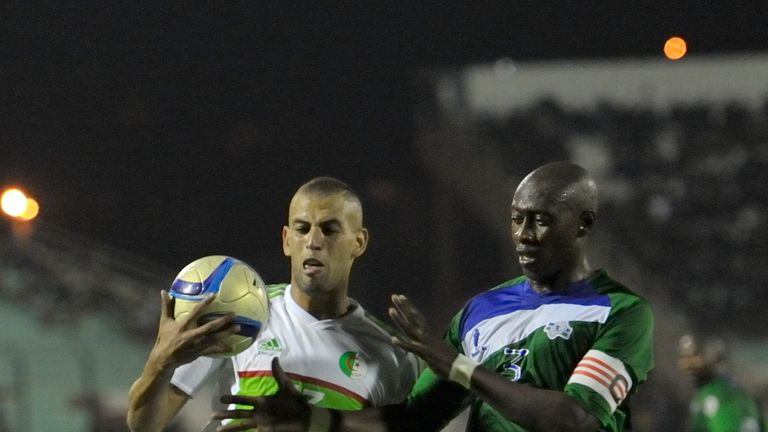 Algeria's Slimani Islam (L) vies with Lesotho's Basia Makepe during 2017 African Cup of Nations qualifying
