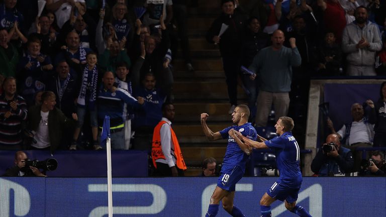 Leicester City striker Islam Slimani (centre) celebrates scoring his team's first goal 