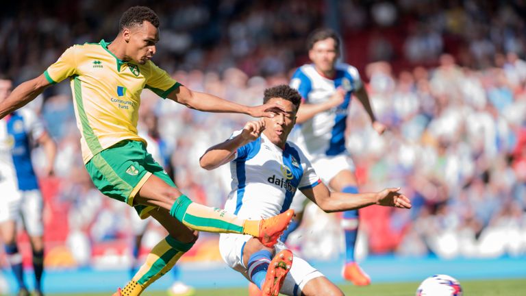 BLACKBURN, ENGLAND - AUGUST 06: Jacob Murphy of Norwich City is tackled by Adam Henley of Blackburn Rovers during the Sky Bet Championship match between Bl