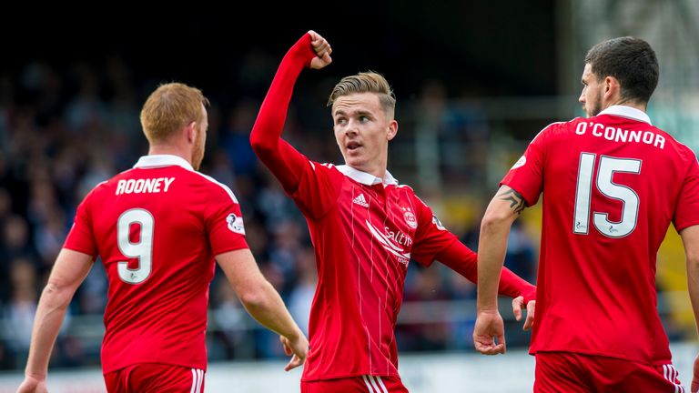 James Maddison celebrates his goal with Adam Rooney and Anthony O'Connor for Aberdeen
