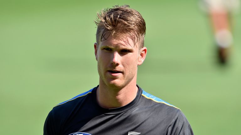 New Zealand player James Neesham walks back to the dressing room during a training session at the Gabba in Brisbane on November 4, 2015, ahead of the first
