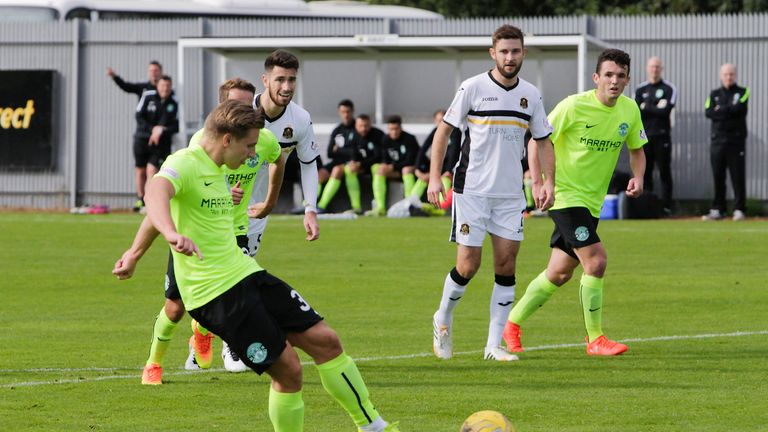 Jason Cummings scores from the spot against Dumbarton to maintain Hibs' 100% start to the season 