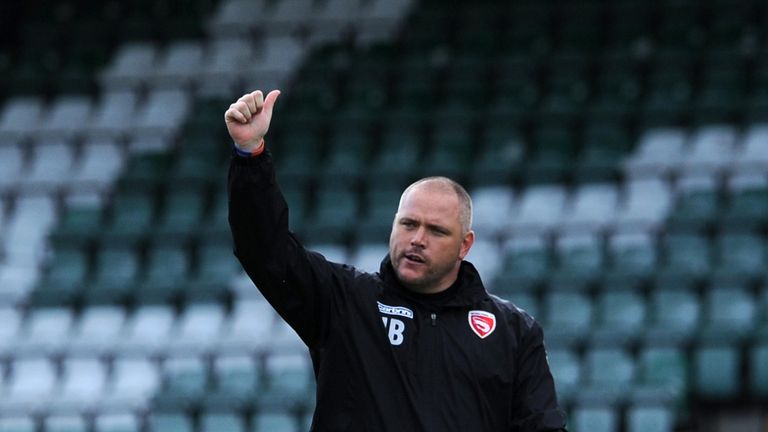 YEOVIL, ENGLAND - SEPTEMBER 05: Jim Bentley, Manager of Morecambe gives a big thumbs up after his sides victory during the Sky Bet League Two match between