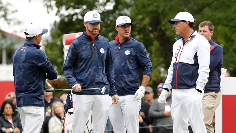 CHASKA, MN - SEPTEMBER 28:  Jimmy Walker, Rickie Fowler, Brooks Koepka and Phil Mickelson of the United States look on during practice prior to the 2016 Ry