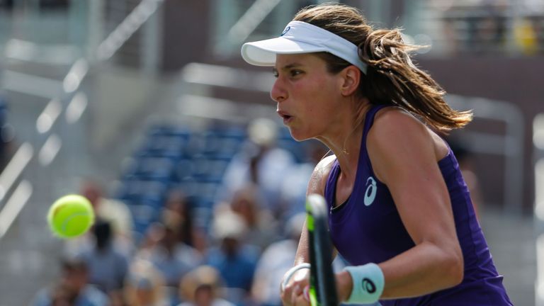 Johanna Konta of Britain hits a return against Belinda Bencic of Switzerland during their 2016 US Open Women's Singles match at the USTA Billie Jean King N