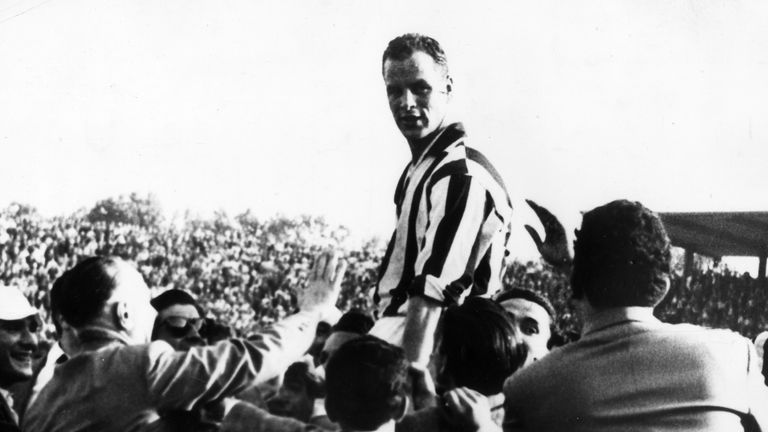 6th August 1958:  Welsh footballer John Charles is held aloft by supporters after he led his team Juventus to victory in the Italian Cup at Turin.  (Photo 