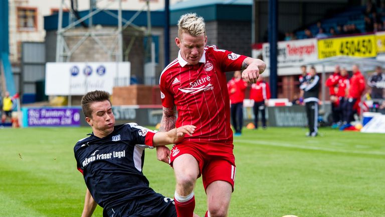 Aberdeen's Johnny Hayes in action against Cammy Kerr