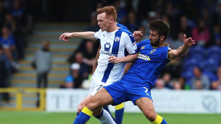 Jon Nolan holds off the challenge of George Francomb 
