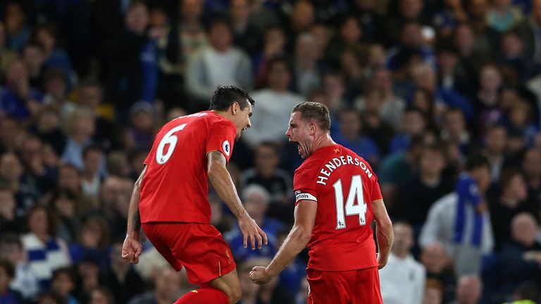 Liverpool's Jordan Henderson (right) celebrates scoring his side's second goal 