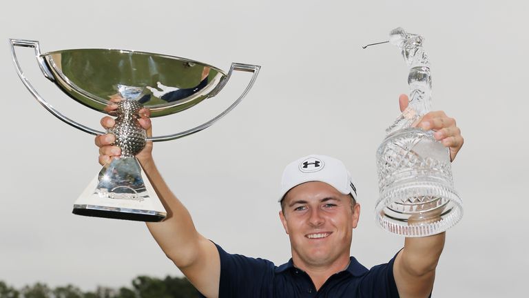 ATLANTA, GA - SEPTEMBER 27:  Jordan Spieth of the United States poses on the 18th green after winning both the TOUR Championship By Coca-Cola and the FedEx