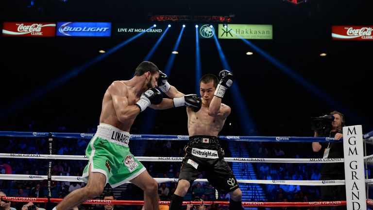 LAS VEGAS, NV - MARCH 8: Nihito Arakawa (R) of Japan evades a punch by Jorge Linares during the lightweight bout at the MGM Grand Garden March 8, 2014, in 