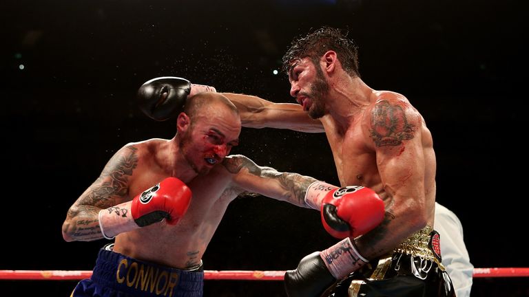 LONDON, ENGLAND - MAY 30:  Kevin Mitchell of England and Jorge Linares of Venezuela exchange blows during their WBC World Lightweight Championship bout at 