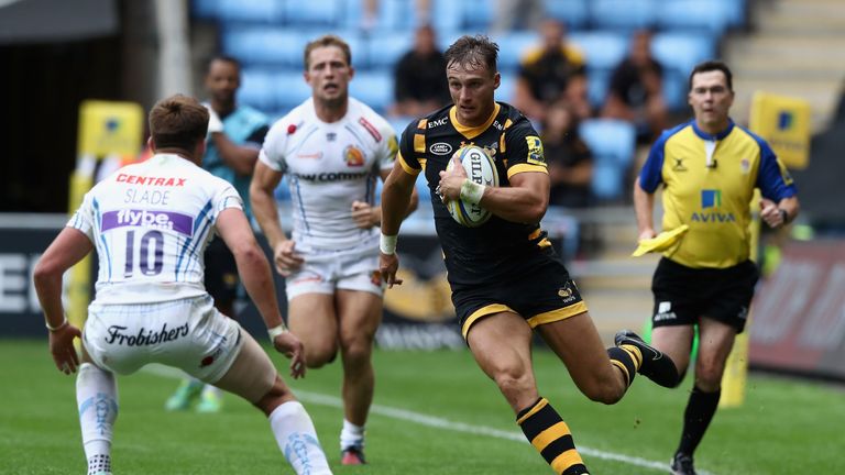 Josh Bassett of Wasps breaks with the ball during the Aviva Premiership match between Wasps and Exeter Chiefs at the Ricoh Arena