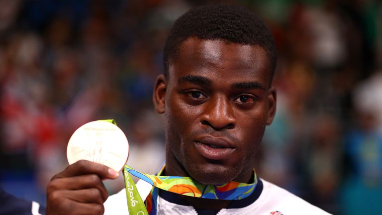 Bronze medalist Joshua Buatsi of Great Britain stands on the podium during the medal ceremony for the Men's Light Heavyweight