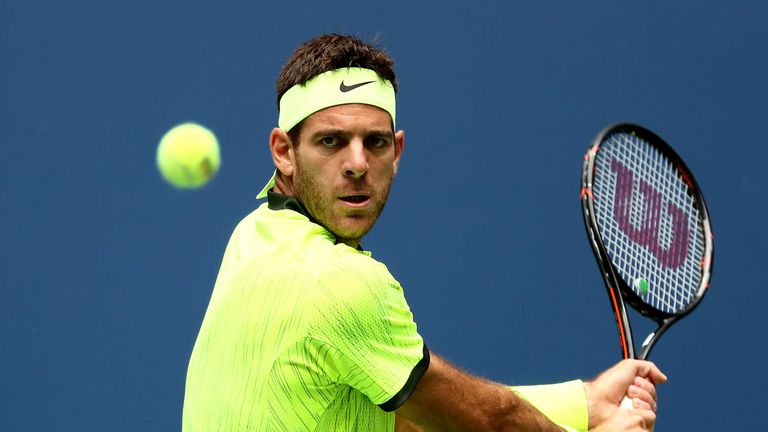 Juan Martin del Potro returns a shot to against Dominic Thiem the US Open fourth round