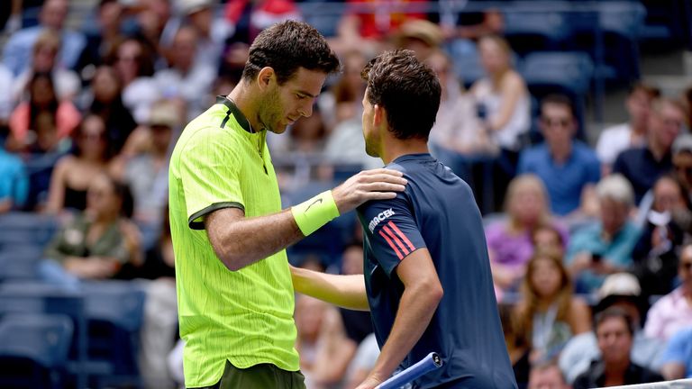 NEW YORK, NY - SEPTEMBER 05:  Dominic Thiem of Austria (R) shakes hands after retiring to Juan Martin del Potro of Argentina during his fourth round Men's 