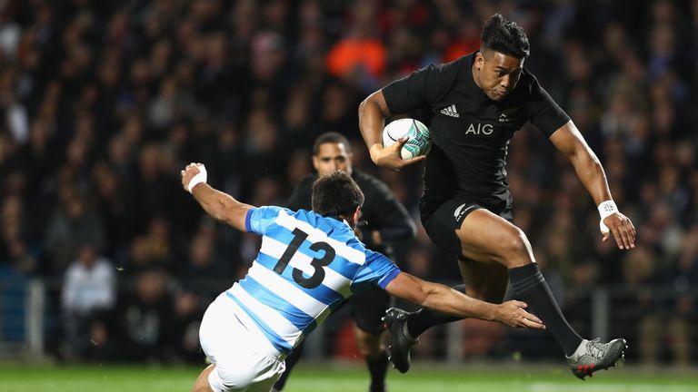  Julian Savea of the All Blacks breaks through the tackle of Matias Orlando of Argentina