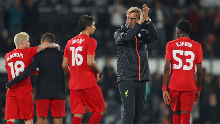 DERBY, ENGLAND - SEPTEMBER 20:  Jurgen Klopp, Manager of Liverpool waves to supporters following victory in the EFL Cup Third Round match between Derby Cou