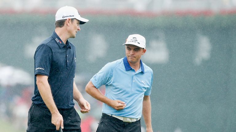 ATLANTA, GA - SEPTEMBER 26:  Justin Rose of England (L) and Rickie Fowler of the United States wait on the 17th green during the third round of the TOUR Ch