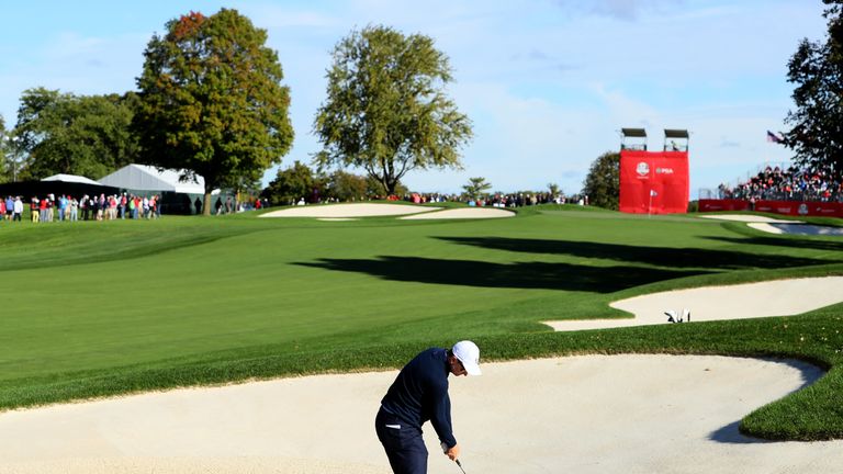 Justin Rose plays out of a bunker during Tuesday's practice