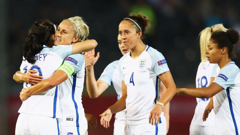 Karen Carney (#10) of England celebrates scoring her team's second goal 