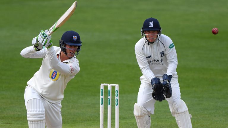 Durham batsman Keaton Jennings hits out watched by wicketkeeper Tim Ambrose