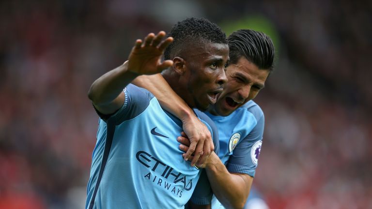 Kelechi Iheanacho of Manchester City (L) celebrates scoring his side's second goal v Man Utd with his team-mate Nolito