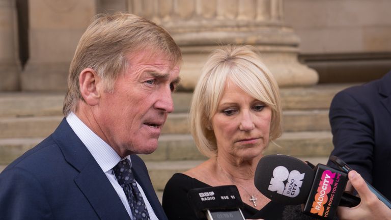 LIVERPOOL, ENGLAND - SEPTEMBER 22:  Kenny Dalglish speaks to the press with his wife Marina outside St George's Hall after he was honoured with the Freedom