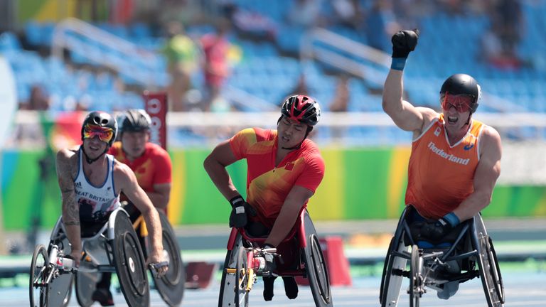 (left-right) Great Britain's David Weir, China's Liu Yang and The Netherlands' Kenny Van Weeghel compete in the T54 Men's 400 Metre final during the fifth 