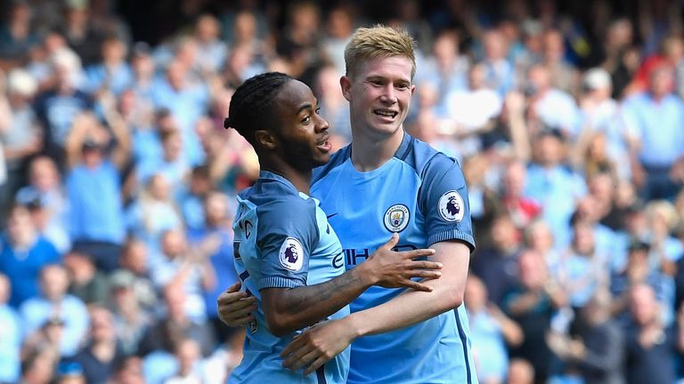 MANCHESTER, ENGLAND - SEPTEMBER 17:  Raheem Sterling of Manchester City (L) celebrates scoring his sides third goal with Kevin De Bruyne of Manchester City