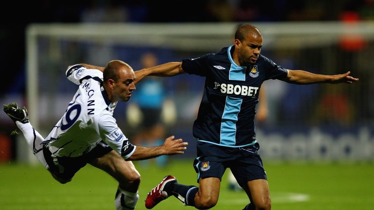BOLTON, ENGLAND - SEPTEMBER 22:  Kieran Dyer of West Ham moves away from Gavin McCann of Bolton Wanderers during the Carling Cup third round match between 