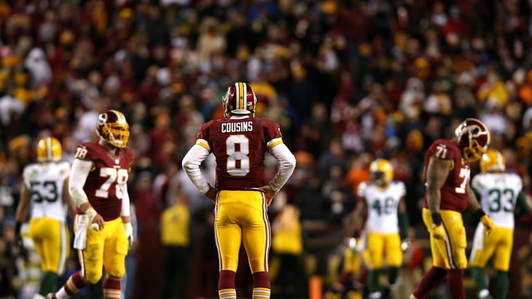 LANDOVER, MD - JANUARY 10: Quarterback Kirk Cousins #8 of the Washington Redskins looks on against the Green Bay Packers at FedExField on January 10, 2016 