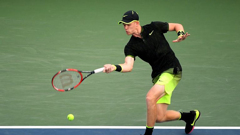 NEW YORK, NY - SEPTEMBER 02:  Kyle Edmund of Great Britain returns a shot to John Isner of the United States during his third round Men's Singles match on 