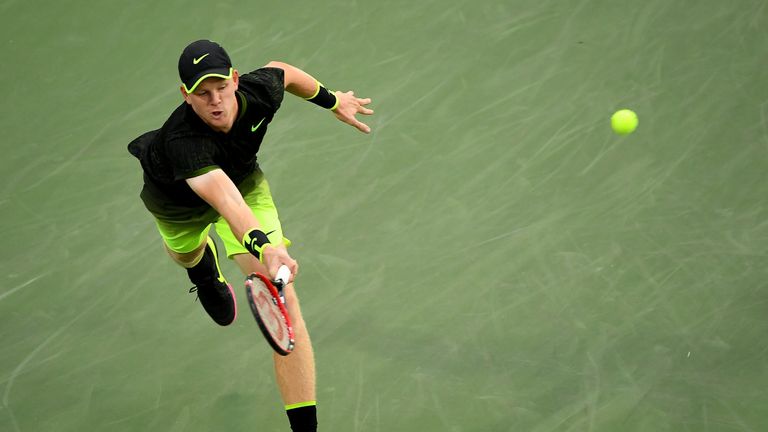 Kyle Edmund resisted the big-serving Isner to reach the fourth round of a grand slam for the first time