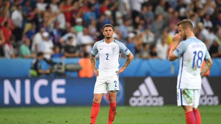 England's defender Kyle Walker (L) and England's midfielder Jack Wilshere react after England lost1-2 to Iceland in the Euro 2016 round of 16 football matc