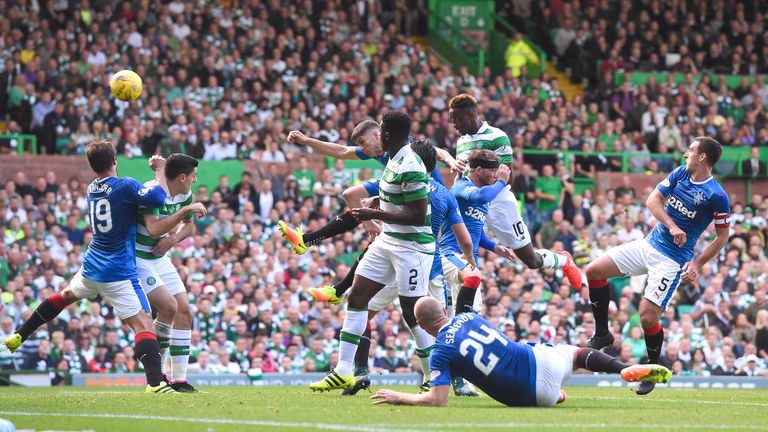 Celtic's Moussa Dembele (2nd R) heads his side into the lead