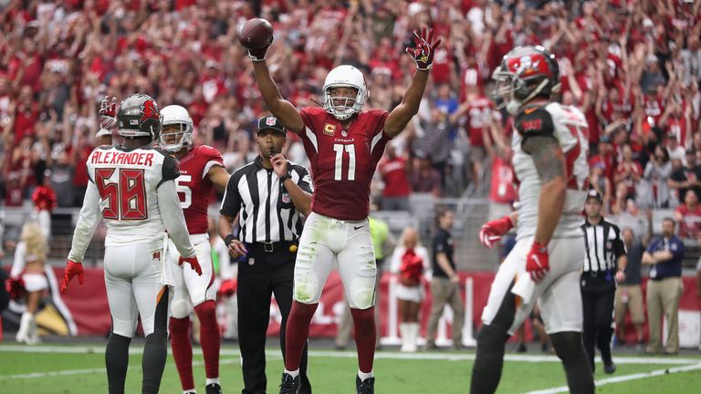 GLENDALE, AZ - SEPTEMBER 18:  Wide receiver Larry Fitzgerald #11 of the Arizona Cardinals reacts after a first down reception against the Tampa Bay Buccane