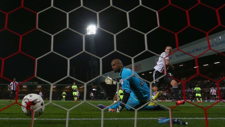 BRENTFORD, ENGLAND - SEPTEMBER 27:  Lasse Vibe of Brentford celebrates scores a goal during the Sky Bet Championship match between Brentford and Reading at