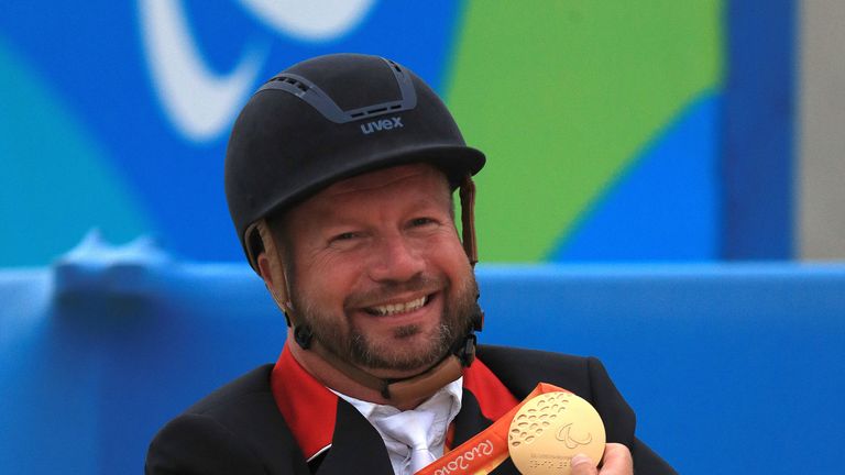 Great Britain's Lee Pearson celebrates with the Gold medal for the Grade IB Independent Freestyle Test during the ninth day of the 2016 Rio Paralympic Game