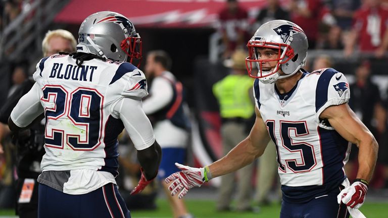 GLENDALE, AZ - SEPTEMBER 11:  Wide receiver Chris Hogan #15 of the New England Patriots is congratulated by running back LeGarrette Blount #29 after scorin