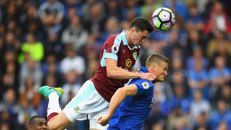 Michael Keane outjumps Robert Huth